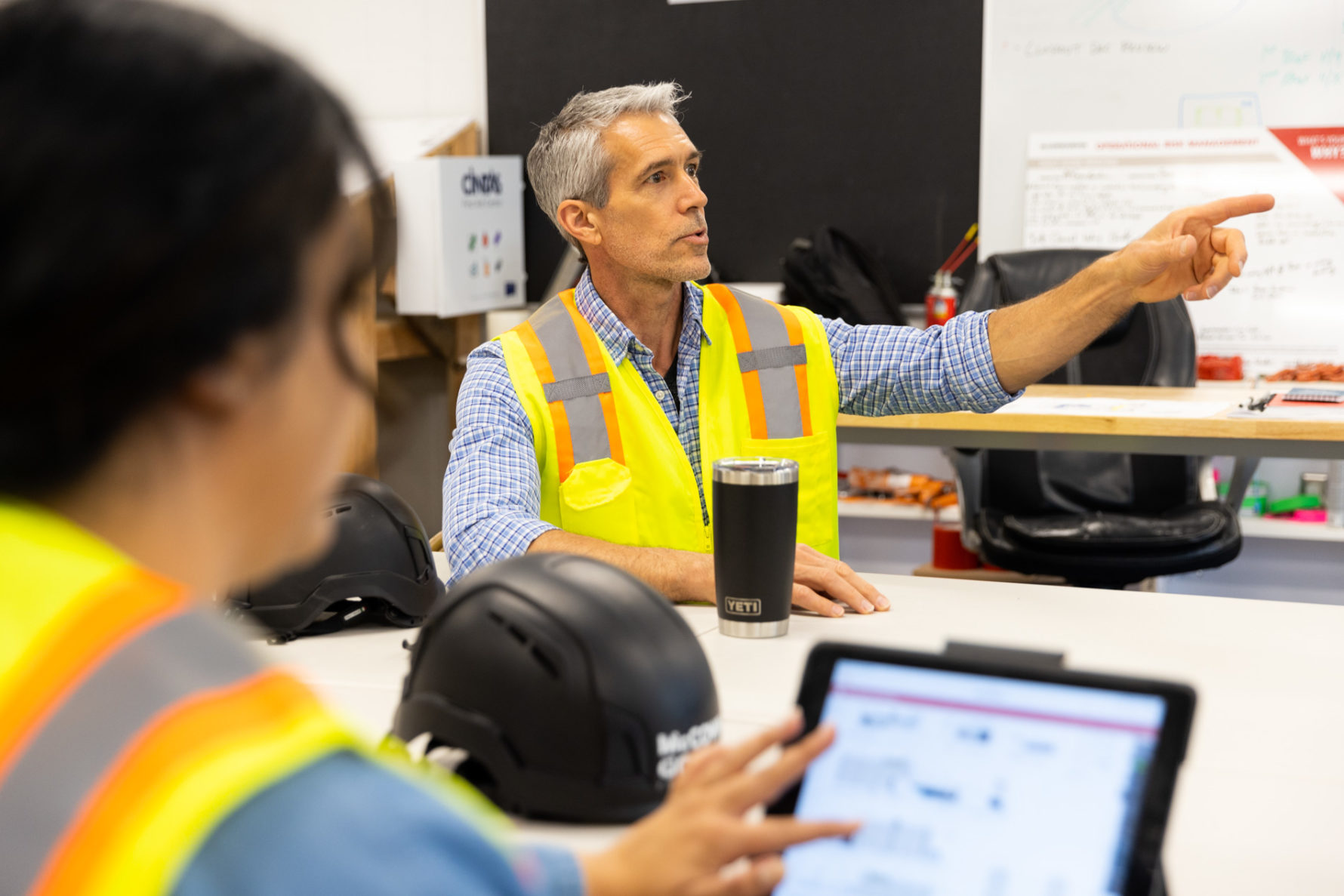 A McCownGordon Construction associate speaking in a project meeting