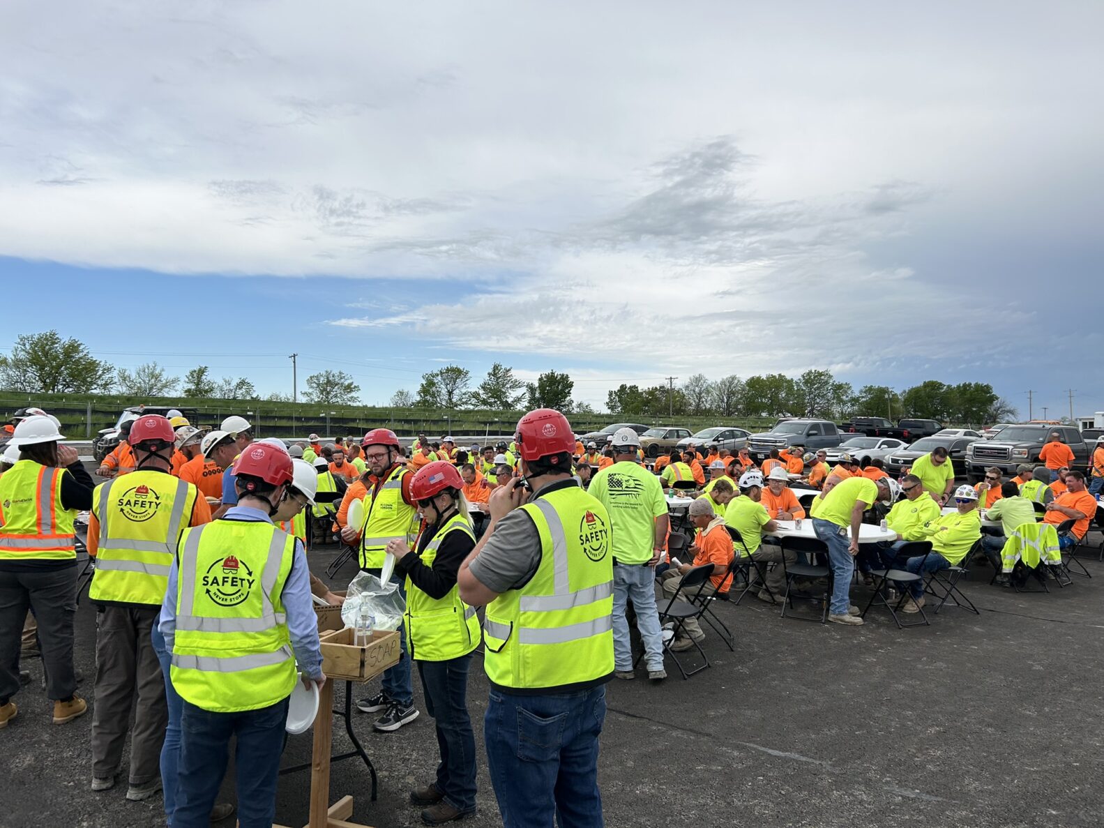 McCownGordon's manufacturing construction team celebrating a topping out with trade partners by hosting a barbeque