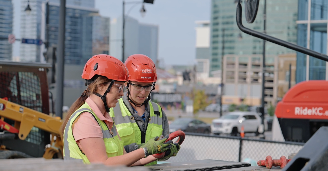 Two McCownGordon Construction associates talking on a job site in downtown Kansas City