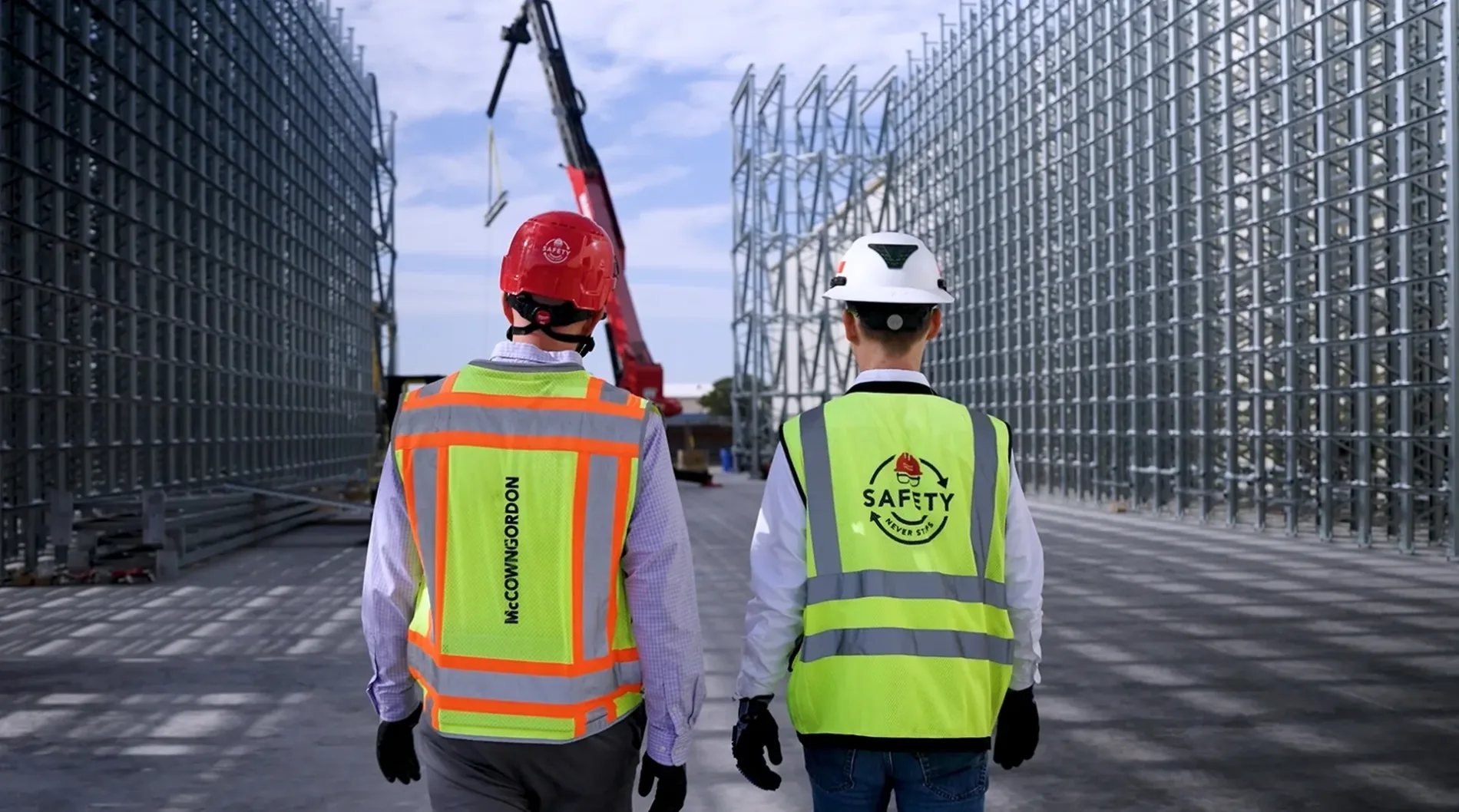 McCownGordon associate walking with an owner on an industrial manufacturing jobsite