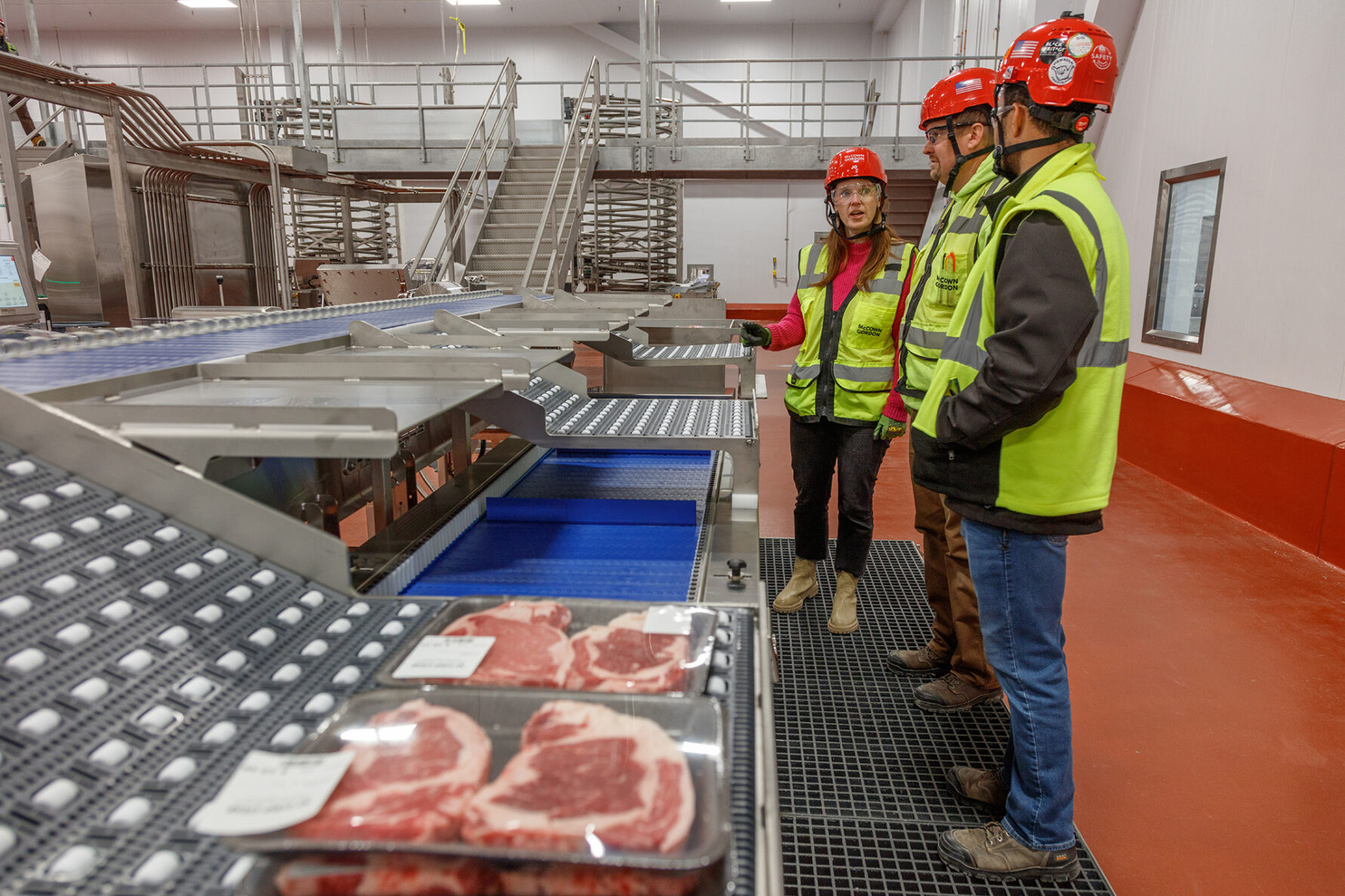 McCownGordon associates testing a manufacturing line inside a beef processing facility