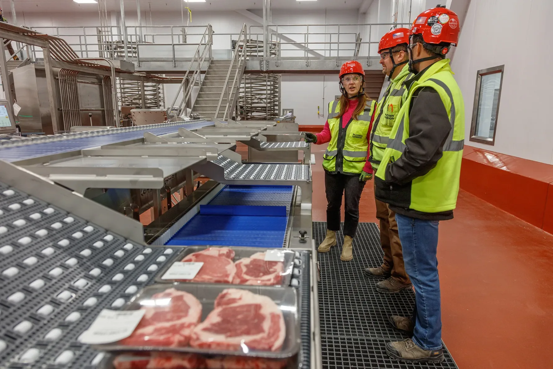 McCownGordon associates testing a manufacturing line inside a beef processing facility